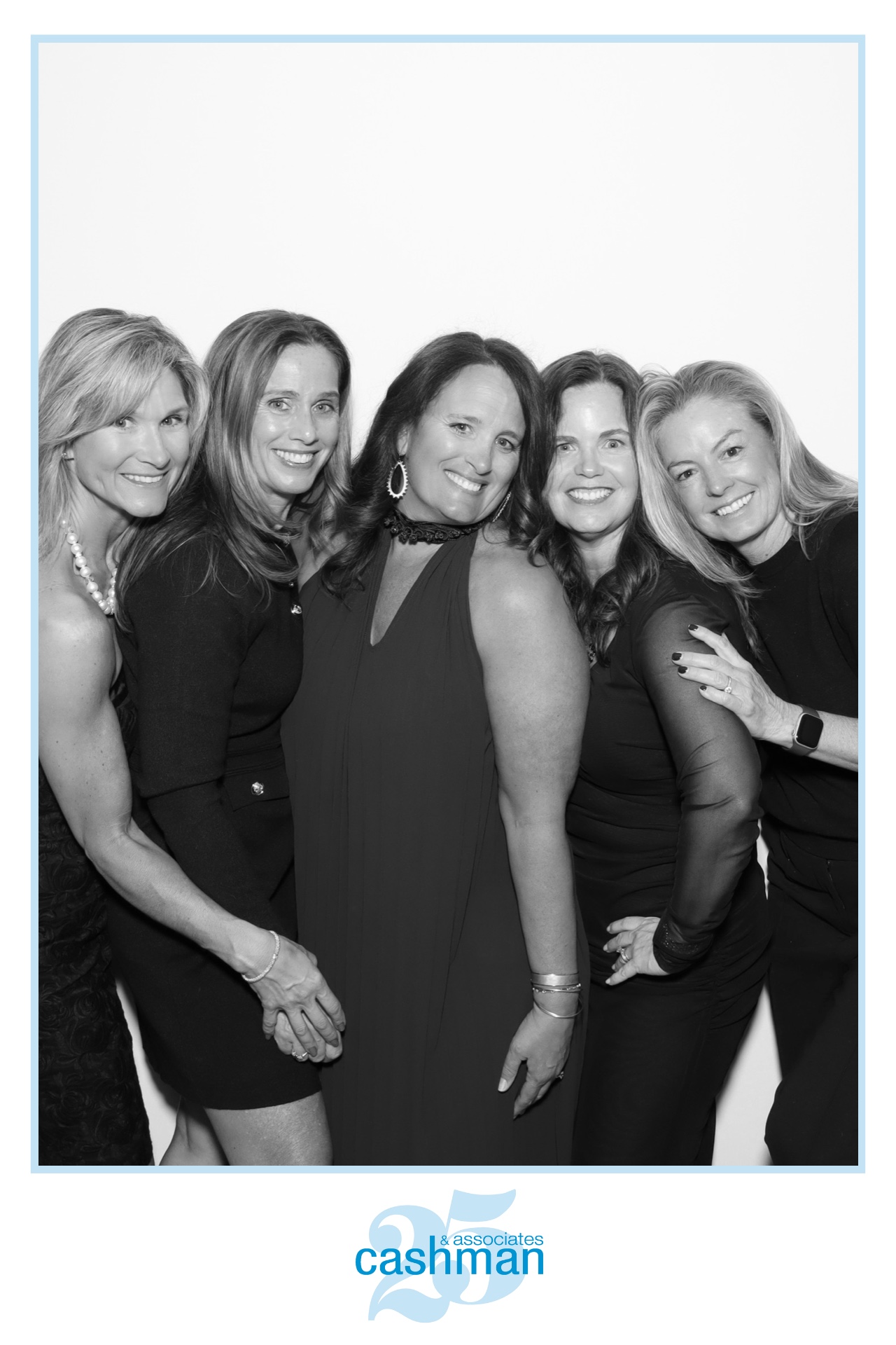 friends posing in photobooth