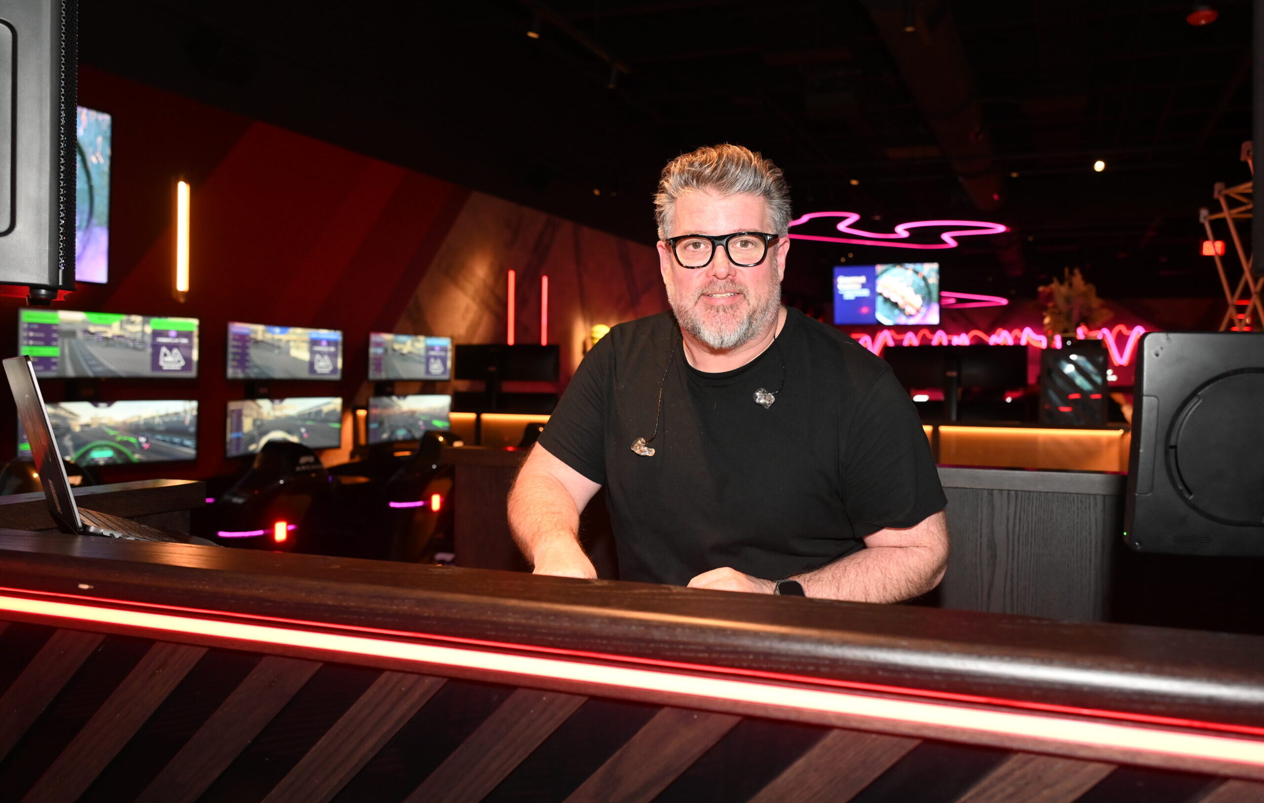 DJ Eddie Tully mixing at F1 Arcade