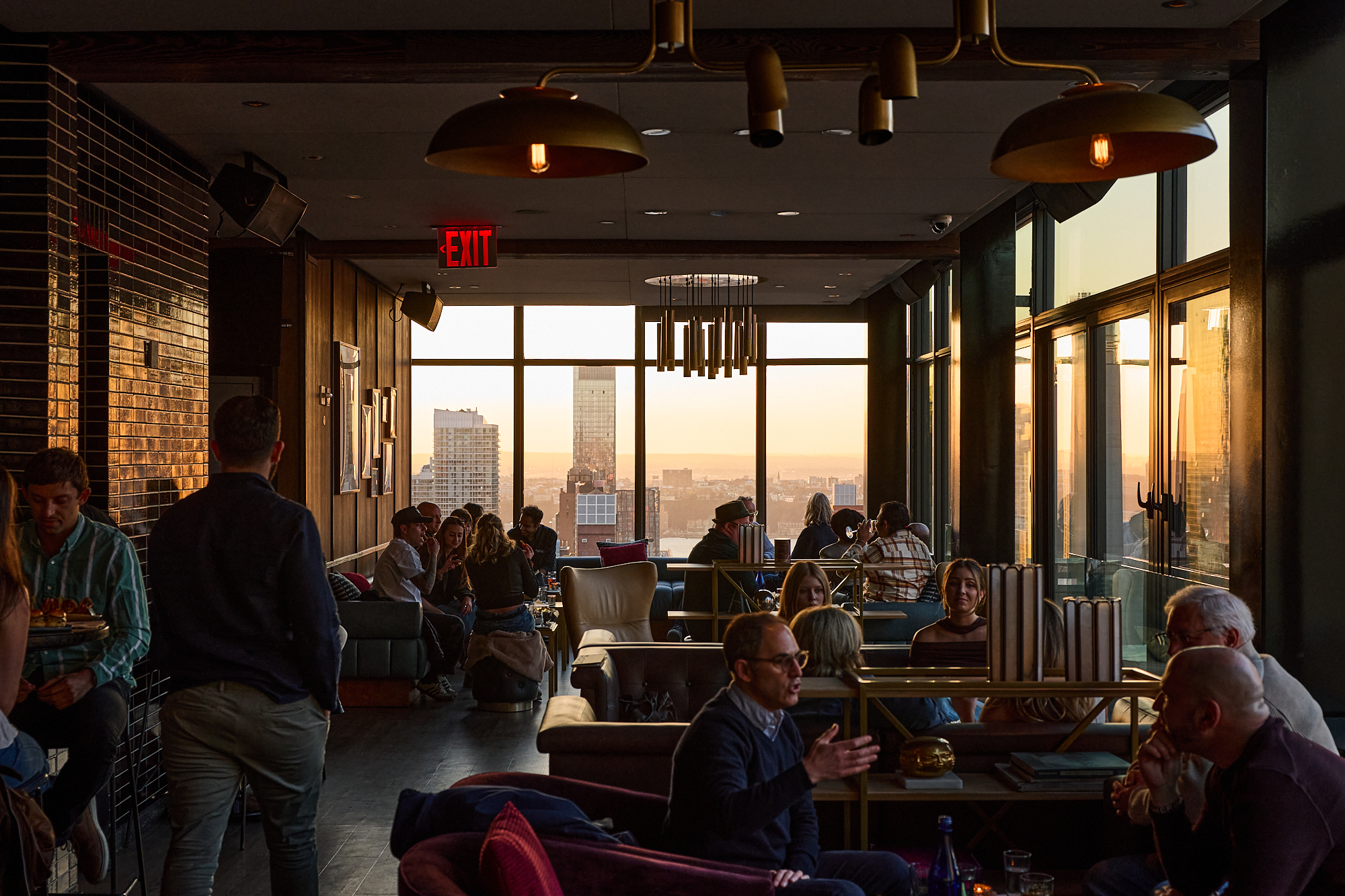 Indoor dining with skyline views
